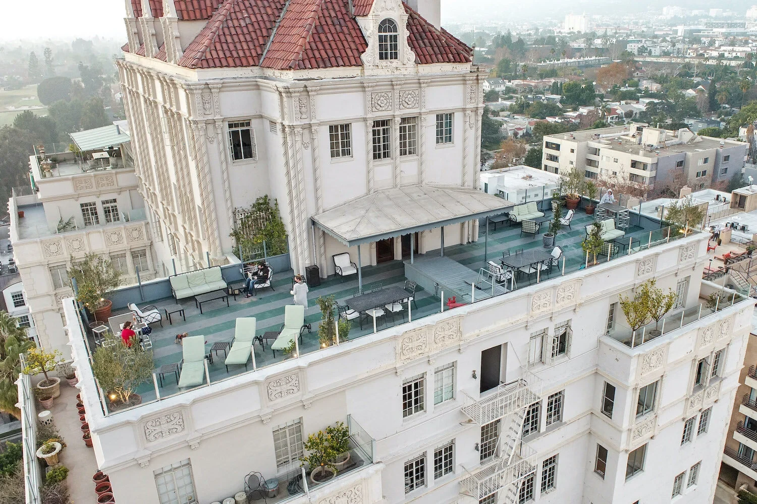 El Royale — rooftop terrace with lounge seating and panoramic city views