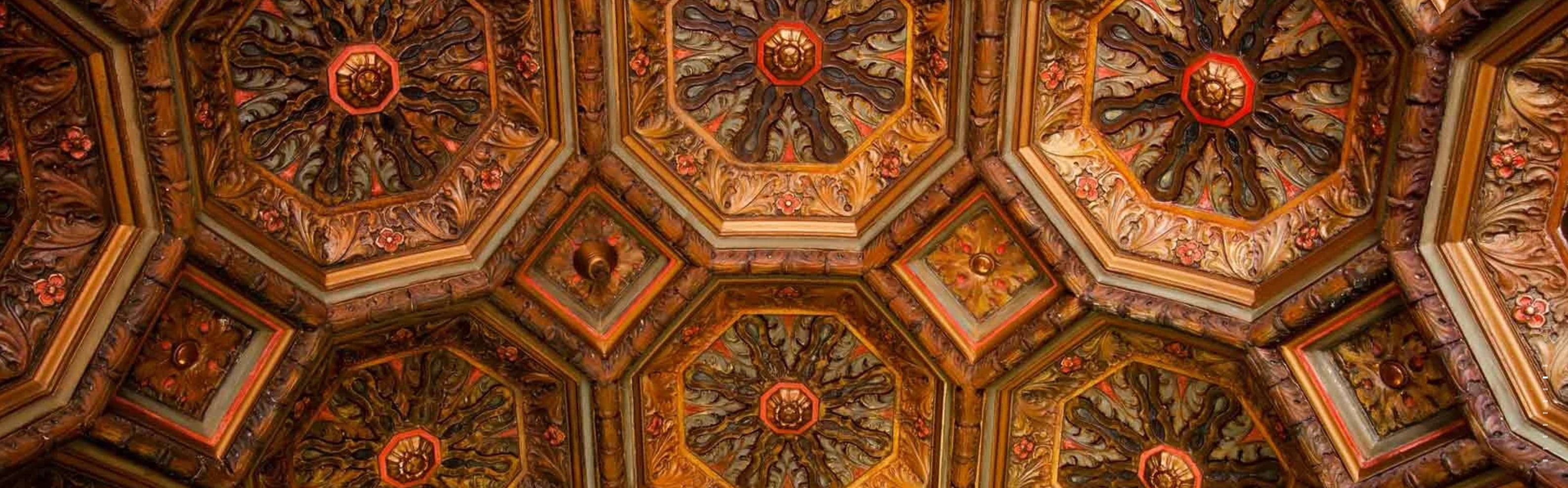 Ornate hand-painted octagonal ceiling at The El Royale Apartments